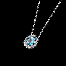 Подвеска из комбинированного золота с и топазом и бриллиантами