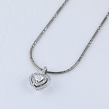 Подвеска из комбинированного золота с бриллиантами