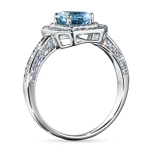 Кольцо из комбинированного золота с и топазом и бриллиантами